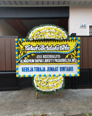 Papan Bunga Duka di Mento